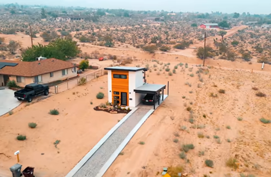 Man shows off his two story tiny house and the inside is far from what you’d expect